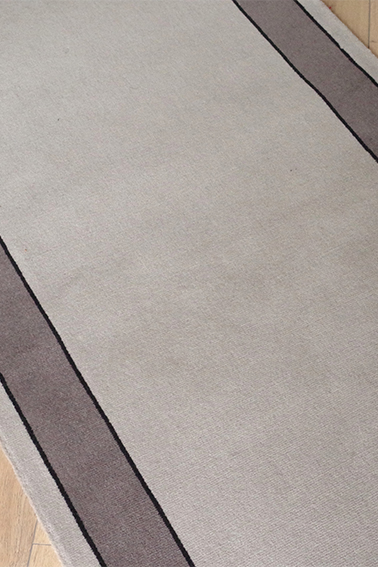 DÉSTOCKAGE DE TAPIS