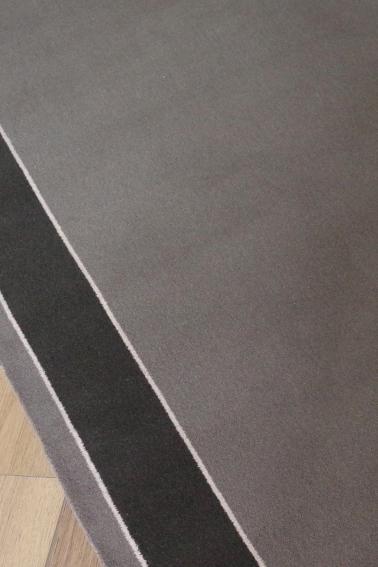 DÉSTOCKAGE DE TAPIS