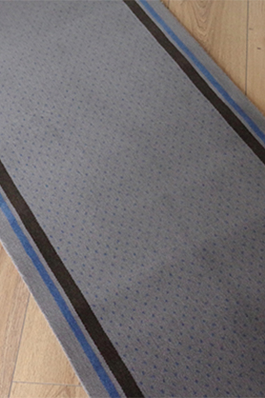 DÉSTOCKAGE DE TAPIS