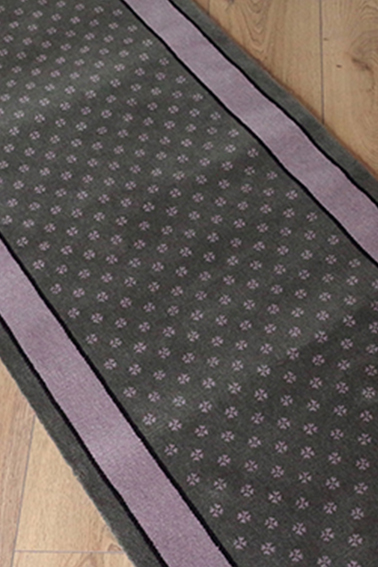 DÉSTOCKAGE DE TAPIS