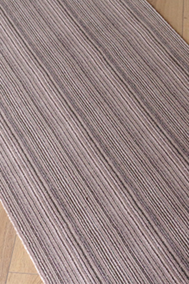 DÉSTOCKAGE DE TAPIS