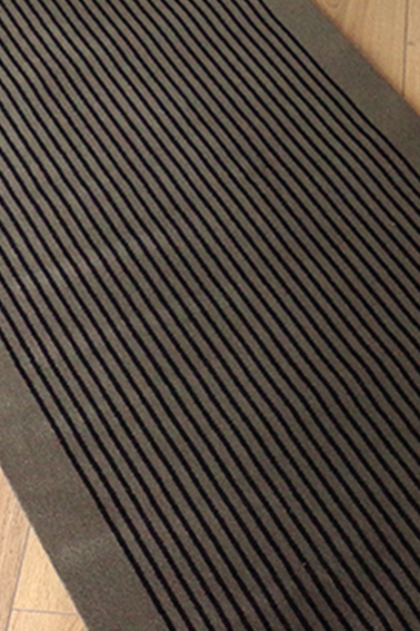 DÉSTOCKAGE DE TAPIS