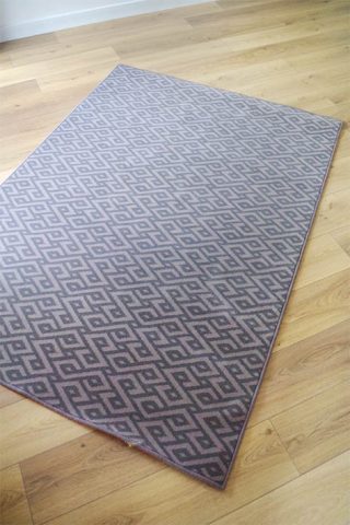 tapis d'intérieur gris à motifs géométriques