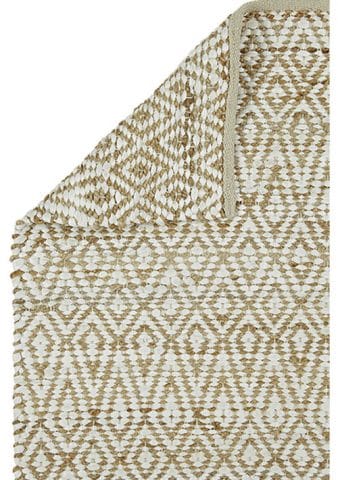 tapis beige et blanc géométrique