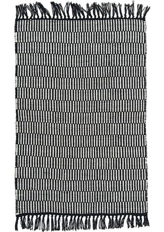 tapis géométrique noir et blanc avec franges