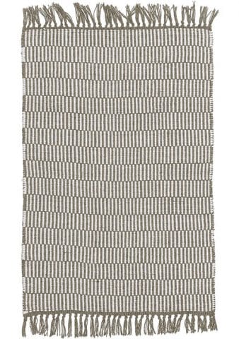 tapis beige et blanc avec franges