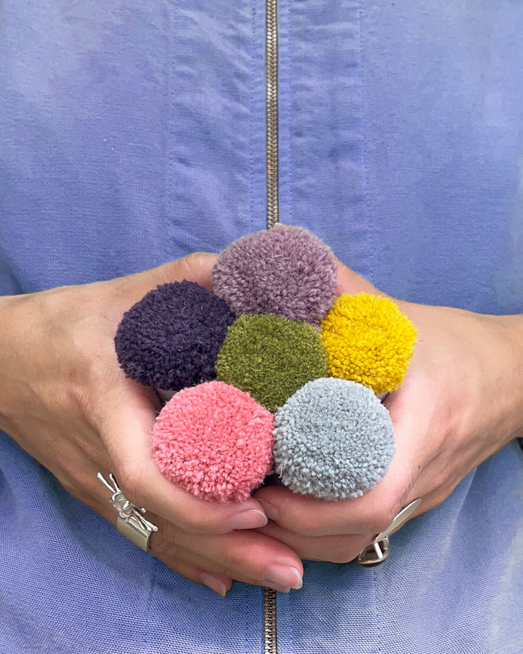 Pompons et finitions de tapis sur mesure DMT Le Comte